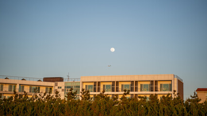 Modern Building under Full Moon