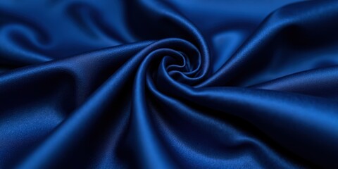 Fototapeta premium Gleaming dark royal blue fabric with a rich, contrasting light blue weave; its smooth, lustrous surface captures an elegant and luxurious depth in every thread