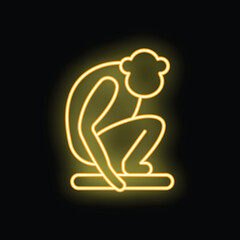 Glowing yellow neon style icon of a monkey picking up a peanut, isolated on a black background