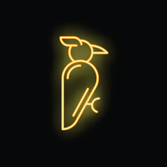 Bright yellow neon sign of a woodpecker bird is glowing on a black background