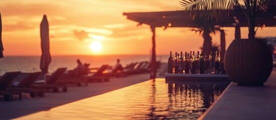 Ibiza sunset with vibrant sky and beach club ambiance featuring spacious area for text and relaxation scene by the poolside