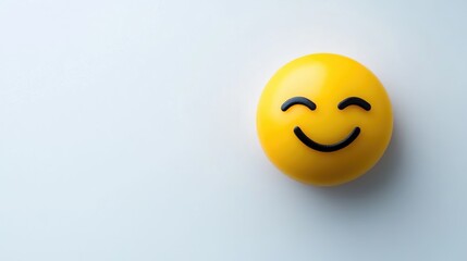 Winking emoji with expressive smile on minimalistic background for creative text placement and communication design