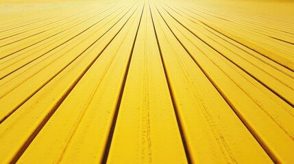 Obraz premium Vibrant Yellow Running Track Surface with Endless Perspective and Horizontal Lines Ideal for Sports Backgrounds and Athletic Themes