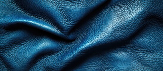 Obraz premium Blue textured leather close-up detailed view with wrinkles and natural grain structure providing a rich surface. Copy Space.