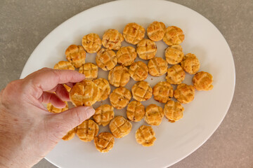 homemade golden scones on a white plate