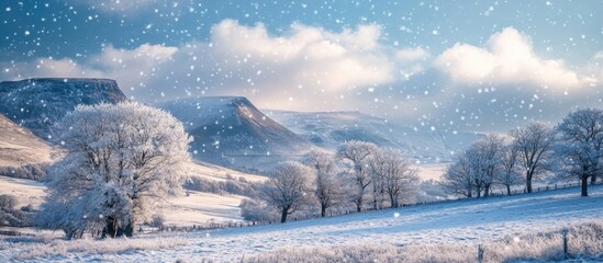 Obraz premium Snowy winter landscape with frosted trees and mountains under a cloudy sky Copy Space