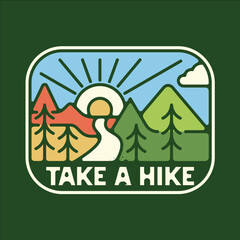 A green sign with mountains and trees and the words "Take a hike" written on it. The sign is meant to encourage people to go on a hike and enjoy the outdoors