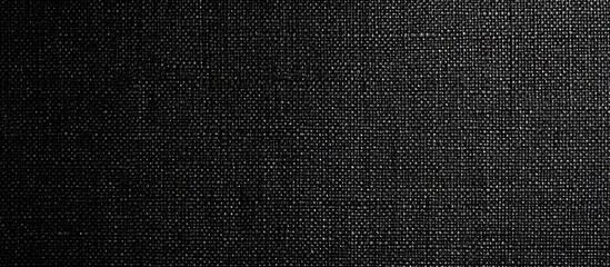 Textured black fabric background with subtle weave pattern and Copy Space for design elements or text placement.