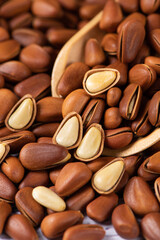 close up of roasted pine nuts background 