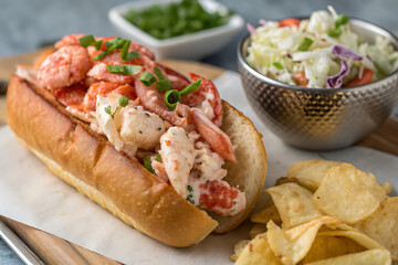 fresh lobster roll, with chunks of succulent lobster meat lightly dressed in butter and mayonnaise, served in a toasted brioche bun. 