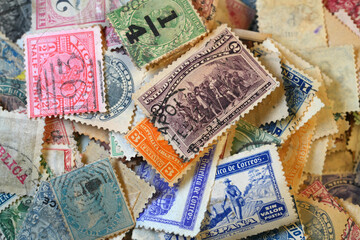A colorful collection of vintage classical used postage stamps.