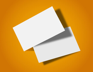 Business card blank mockup design in orange background.