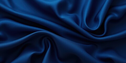 Fototapeta premium Royal blue satin with smooth, glossy texture; its graceful folds capture light, evoking elegance in every crease
