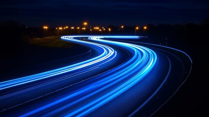 Abstract Blue and White Light Trails on a Night Highway, Long Exposure Photography of City Traffic