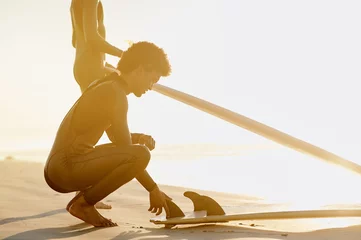 Fototapete Mockup, fitness and man with surfboard, water sports and exercise for wellness, balance and healthy lifestyle. Male surfer, athlete and guy outdoor, beach and seaside holiday for practice and sunset © peopleimages.com