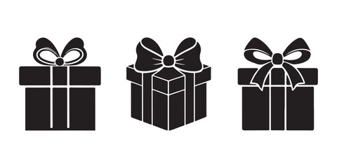 Three elegant gift boxes with decorative bows, perfect for holiday celebrations, birthdays, and special occasions