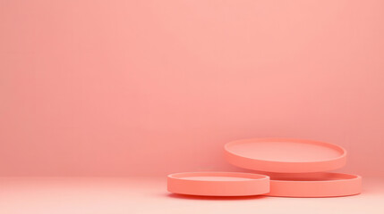 Pastel Podium: A minimal and stylish backdrop for showcasing products, featuring a trio of stacked pink cylindrical platforms against a soft pink background.  