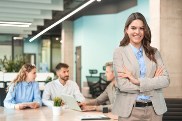 Face of beautiful businesswoman on the background of business people.