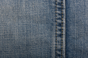 Denim fabric with blue thread seams, denim jacket, denim pants, for background or fabric sample...