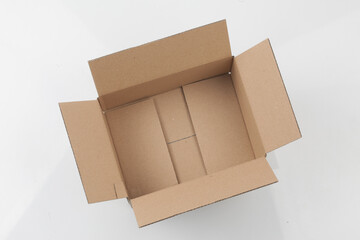 A thin object made from vegetable fiber. It is mainly used for writing, drawing, or printing.