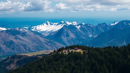 Majestic snow-capped mountain range viewed from a forested hilltop with two houses, showcasing a serene landscape.