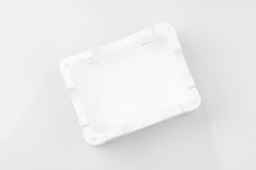 Styrofoam is a synthetic material made up of small air-filled particles that is lightweight and has excellent heat insulating properties.