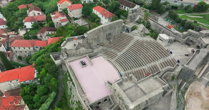 Flight over ancient Herceg Novi amphitheatre in Montenegro hillside; drone