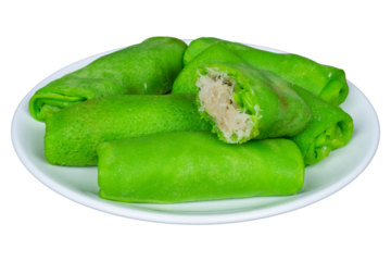 Traditional dadar gulung on white plate isolated background