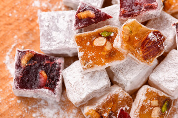Sweet food Turkish delight, assorted rahat locum in form of cubes with nuts and powdered sugar, traditional food