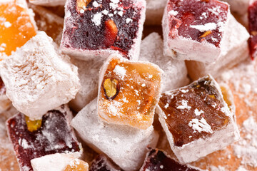 Sweet food Turkish delight, assorted rahat locum in form of cubes with nuts and powdered sugar, traditional food