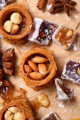 Sweet food Turkish delight on wooden background, assorted locum and candy as decorated backdrop