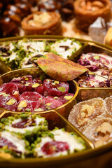 Sweet food Turkish delight on wooden background, assorted locum and candy for decorated backdrop