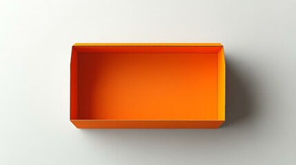 An empty rectangular cardboard box with open flaps and a vibrant orange interior, placed on a white background, highlighting packaging design