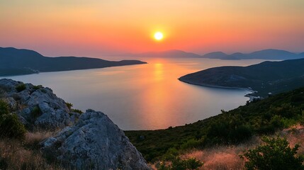 A relaxing sunset over the hills and coastline of Peloponnese, Greece, symbolizing the peaceful end of the day, isolated on a white background