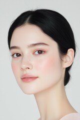 Fototapeta premium Soft Natural Beauty with Radiant Skin and Minimal Makeup