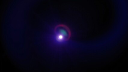 Obraz premium Abstract Purple and Teal Lens Flare on Black Background