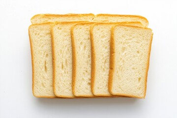 Top-down view of freshly sliced bread on clean white surface for culinary and food photography