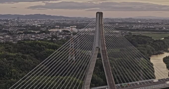Toyota Japan Aerial v6 zoomed drone flyover Doaicho and around the Arrows Bridge captures the winding Yahagi River and the Togaricho cityscape at sunset - Shot with Mavic 3 Pro Cine - Oct 10th 2023