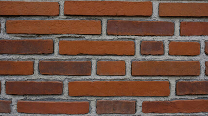 Obraz premium Realistic Red Brick Material Texture for Use in Home Renovation and Industrial Architecture