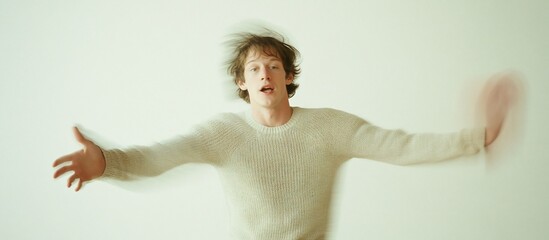 Man falling, arms outstretched, white background, motion blur, website banner