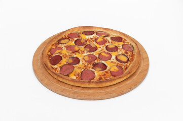 Pizza with salami, cheese and sausage on a white background