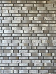 White and gray brick wall of a new house