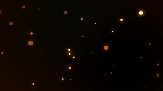 Golden shiny particles overlay with glittering gold dust moving outward on a black screen.