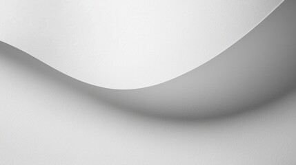 Subtle curve of a white surface creates a gentle shadow.