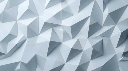 Obraz premium The image contains an abstract background of many light-grey, three-dimensional triangles forming a textured, undulating surface.