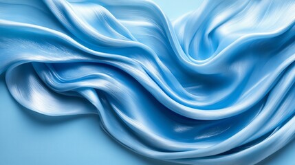 Obraz premium Luxurious and Elegant Blue Silk Fabric Draped Gracefully over a Complementary Blue Background Creating a Rich Visual Texture Evoking Calmness and Sophistication in a Fashionable Setting