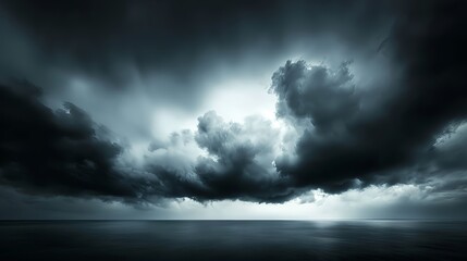 Obraz premium Dark Stormy Ocean Under Dramatic Clouds