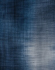 Deep navy fading into muted gray worn denim gradient texture background