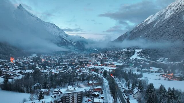 foggy winter morning in Chamonix Valley, aerial view of ski resort in France, winter holidays in Chamonix, drone view of French tourist destination in the Alps