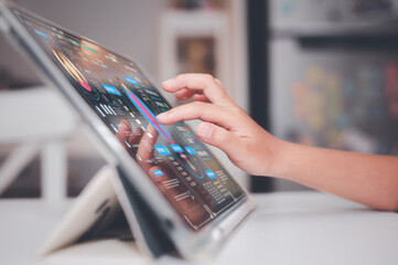 learning concept children using digital tablet in classroom working with robot analysing or...
